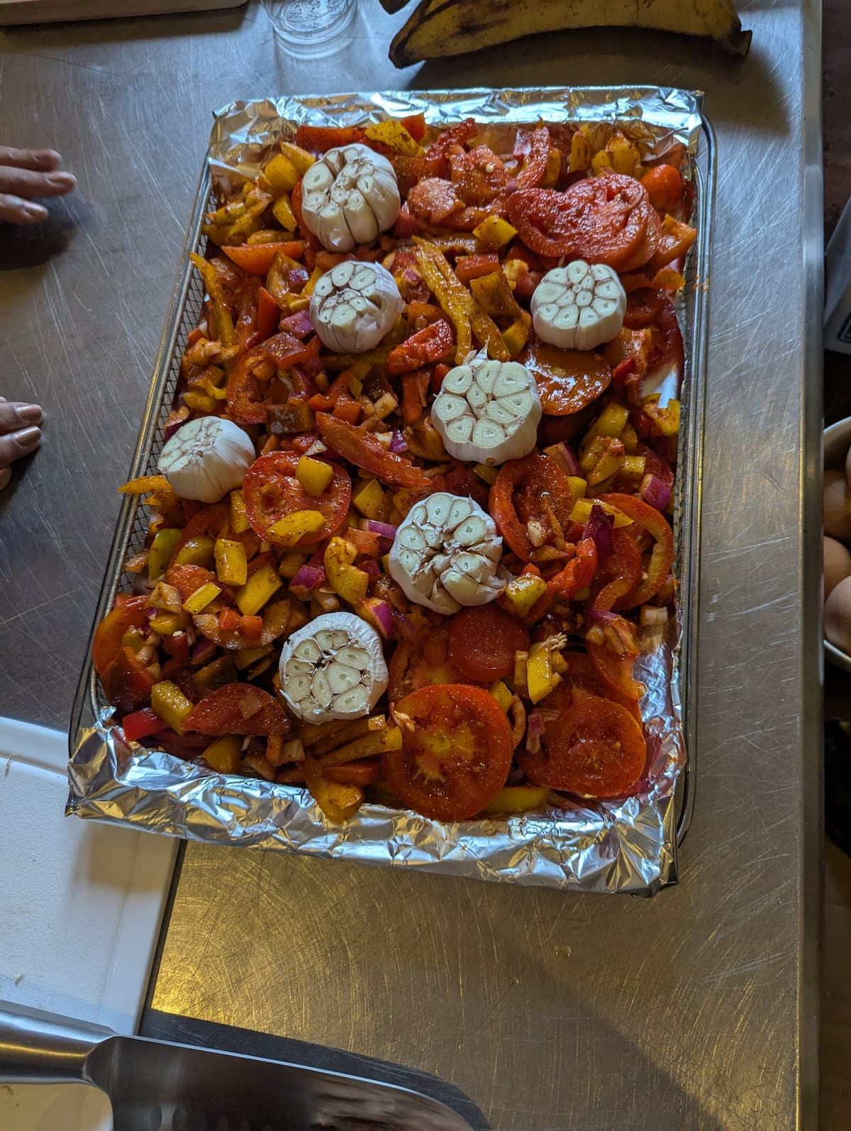 Roasted vegetables and garlic prepared for a cooking class in Casco Viejo, Panama City