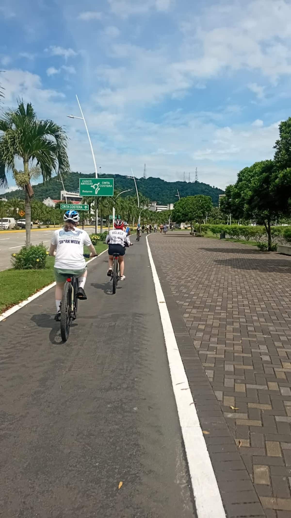 Cyclists exploring the scenic bike path near Casco Viejo during an adventure tour in Panama City, Panama