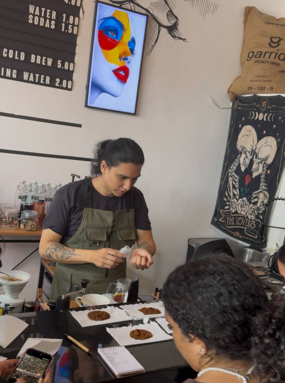 Barista preparing Geisha coffee for tasting at Bandits Adventure Tours Panama's Geisha Coffee Tasting Casco Viejo experience in Panama City.