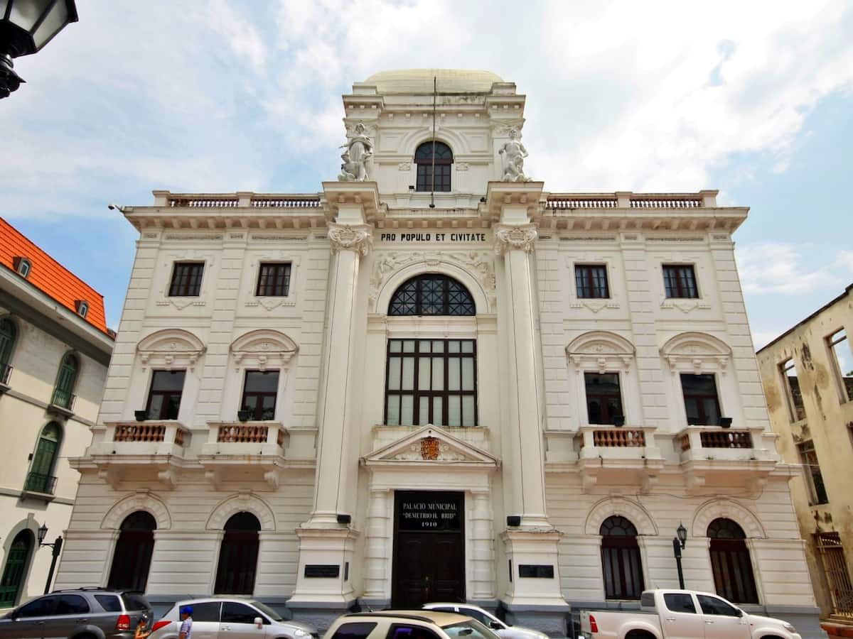 Palacio Municipal in Panama City, a historic neoclassical building with statues and balconies, captured during a social-political walking tour.